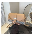 Detail of color-block shoulder bag featuring vintage patterned fabric and metal buckle - Khaki
