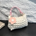 White ruched crossbody bag with pink knotted handle and decorative flower charm - White and Pink