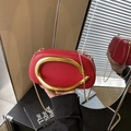 Red leather evening clutch bag with chunky gold metal hardware and chain strap - Red