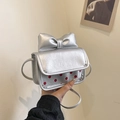 Silver bow mini crossbody bag with red polka dots and fashion engraving detail - Silver