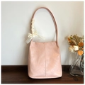 Pink pleated leather bucket bag with white lace bow and vintage minimalist texture - Pink