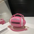 Pink rugby-shaped crossbody bag with white stripes and elegant golden chain strap - Large / Rose Red