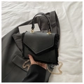 Fashionable black faux leather small square bag with fringe details and gold chain strap - Black