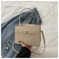Elegant cream white crossgrain leather handbag with turn-lock and detachable strap - White