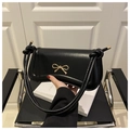 Elegante borsa in pelle PU nera con fibbia a fiocco dorata e tracolla con nodi - Nero