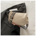 Fashionable beige crossbody bag with geometric wide strap and gold hardware - White
