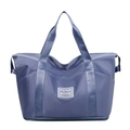 Waterproof blue-purple travel duffel bag with expandable bottom and high-density nylon fabric - Haze Blue