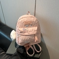 Pink quilted mini backpack with sequined bow detail and white fluffy keychain charm - Small With Pendant / Pink