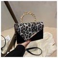 Leopard print crossbody bag with black faux leather and twisted gold metal handle - Black