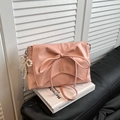 Pink ballet-style shoulder bag with large bow decoration and pearl charm accessory - Pink