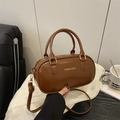 Chic brown retro Boston handbag in glossy vegan leather with a stylish shoulder strap - Brown