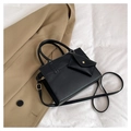 Detail of minimalist black crossbody bag with logo embossing and detachable envelope pouch - Black