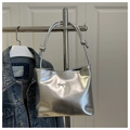 Detail of silver metallic underarm bag with metal bow buckle and knotted shoulder strap - Silver (No Pendant)