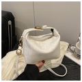 Elegant white bucket bag with snake pattern and golden lock hardware for women - White