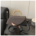 Piccola borsa a tracolla in pelle leopardata con un audace manico in metallo dorato intrecciato - Nero