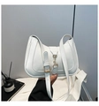 Borsa a spalla bianca a forma di U stile francese con pelle lucida e fibbia oro - Bianco