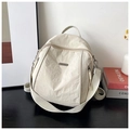 Versatile cream nylon backpack with pleated texture and adjustable shoulder straps - White