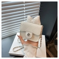 Mini white quilted crossbody bag with large bow and silver chain strap for women - White