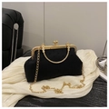 Retro black textured seashell handbag with gold metal clasp and circular handle - Black