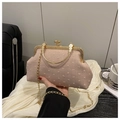Elegant lotus pink textured shell bag with gold clasp and chain strap for women - Pink