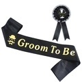 Close-up of Groom To Be black satin sash and matching rosette badge with gold lettering - Black Sash And Badge Set