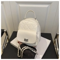 White quilted mini backpack with silver chain strap and metal swivel lock detail - White