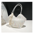 White quilted tote bag with colorful embroidery and shoulder straps for daily use - White