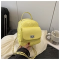 Bright yellow quilted PU leather mini backpack handbag with silver twist lock and chain strap - Yellow