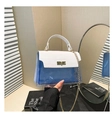 Detail of blue transparent PVC bag with white faux crocodile flap and gold chain strap - White