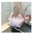 Pink tote bag with embroidery and leather trim shown in elegant natural light - Pink