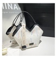 White tote bag with V-shaped opening, colorful stitching, and black leather trim accents - Black and White