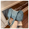 Light blue underarm bag featuring navy bamboo leaf print and durable zipper closure - Blue