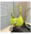 Detail of neon green crescent bag with knotted strap and horseshoe metallic buckle - Green
