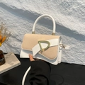 Chic cream leather and raffia patchwork handbag with gold D-shaped buckle and top handle - White