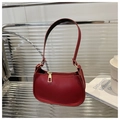 Detail of red pebbled leather small square bag with luxury gold zipper and moon shape - Red