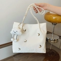 Borsa tote bianca minimalista con ciondolo a farfalla dorata e nuvola morbida - Bianco Sporco con Pendente