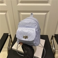 Quilted light purple mini backpack with silver metal chain straps and twist lock - Blue