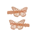Détail de deux pinces à cheveux papillon évidées en or rose avec ailes texturées en 3D sur blanc - Paire d'Or Rose