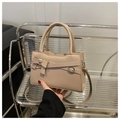 Beige crossbody bag with stylish bow accent and adjustable strap for women - Khaki