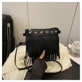 Detail of black crossbody bag with silver studs and long fringe tassels on leather - Black