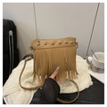 Detail view of camel PU leather handbag with silver studs and elegant hanging fringes - Khaki
