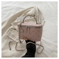 Pink quilted shoulder bag with silver studs and rose charm on a chain strap - Pink
