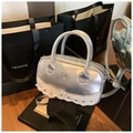 Silberne Mini-Bowlingtasche mit Schleife und herzförmiger Spitze für Damen - Silber