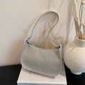 Chique zilveren lovertjes hobo tas met een glanzende glitter afwerking en halve maan vorm - Champagne