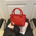 Women's chic red lychee pattern tote bag with top handle and crossbody strap - Red