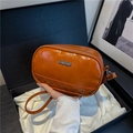 Caramel oil wax leather crossbody bag with JING PIN metal plaque and rivets - Brown