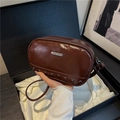 Dark brown leather crossbody bag with metallic rivets and vintage polished finish - Brown