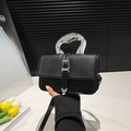 Minimalist black matte handbag with woven flap and artistic silver metal handle - Black