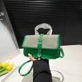 Grass green woven crossbody bag with metallic silver handle and leather trim strap - Green