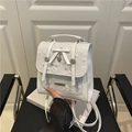 Compacte witte lederen rugzak met een strik en hartvormige hanger voor dames - Wit